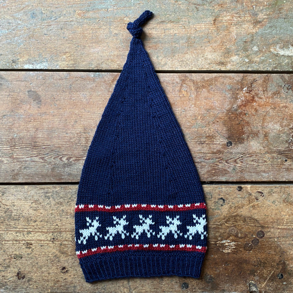 Strikkeopskrift Lille Julie og Julius Nissehue med mønsterstrik