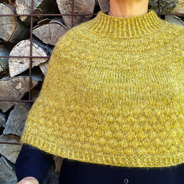 Strikkeopskrift Bobleponcho Isager