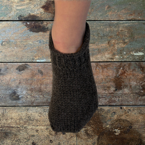 Strikkeopskrift letfiltede hjemmefutter til børn i 11 str. fra str 20/21 til str 35