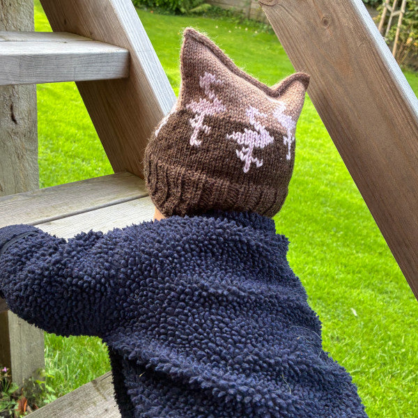 Strikkeopskrift Lille flamingo mønsterstrikket børnehue elastisk hue, der sidder godt på hovedet 